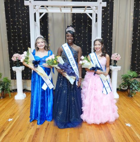 DaNyia Little (middle) was crowned Miss ECMS while Gracie Madrigal (right) was named the seventh grade representative and Rease McElroy (left) was named the sixth grade representative. (Photo courtesy of Liza Miller)