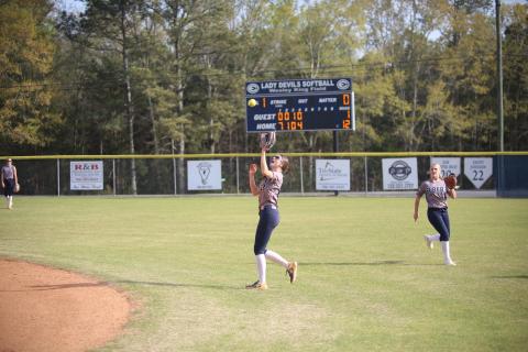 Bryleigh Dickerson catches a fly ball. The freshman hit two home runs aainst Creekview Wednesday. (Photo by Bo Underwood)