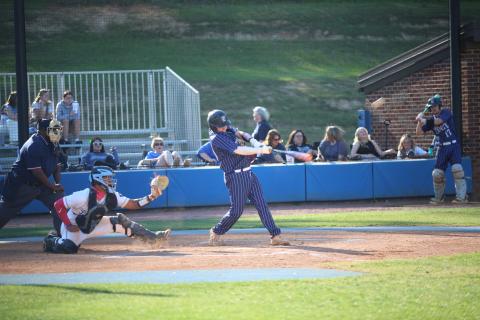 Alex Higginbotham hits a home run in Elbert’s win over Banks County on April 7. (Photo by Bo Underwood)