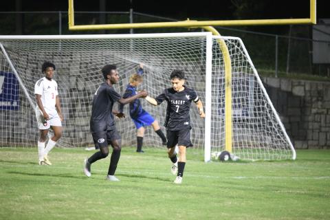 Pablo Medellin (right) and Judeson Lexima (right) celebrate a goal. (Photo by Bo Underwood)