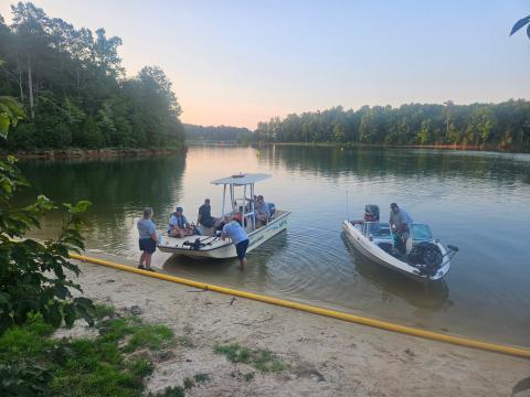 Elbert County EMS Assistant Director Beth Seymour (far left) and the Elbert County dive team put their boat in the water on Lake Richard B. Russell. (Photo courtesy of Justin Hobbs)