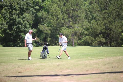 Larry Kesler coaches Nolan Henderson during the GHSA Class A Division 1 championship May 18. (Photo by Bo Underwood)