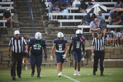 Elbert County's captains, (L-R) Jerrell Sims, Jackson Black and Braylen Huff, take the field. (Photo by Bo Underwood)