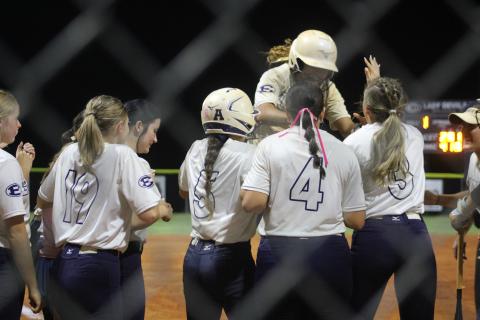 Nakiya Dubose celebrates her second home run against Callaway at home plate. She drove in three of Elbert's six runs in the second game.