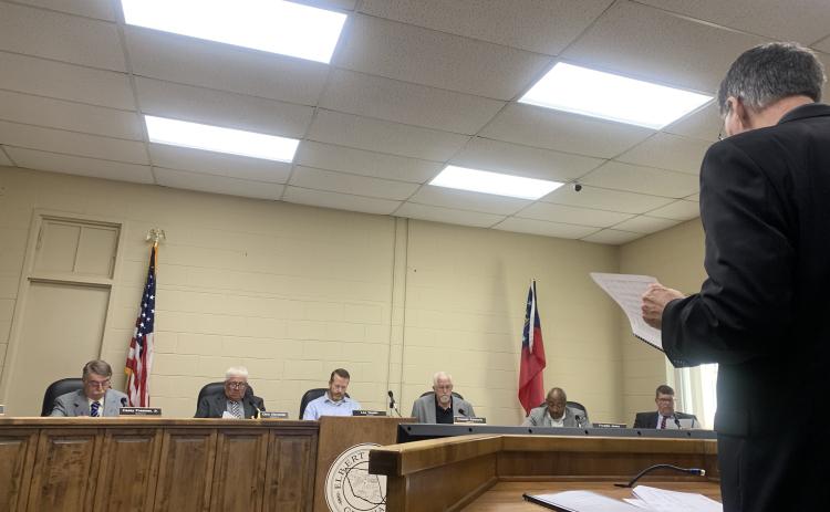 CFO Phil Pitts gives a finance report at Monday night's BOC meeting