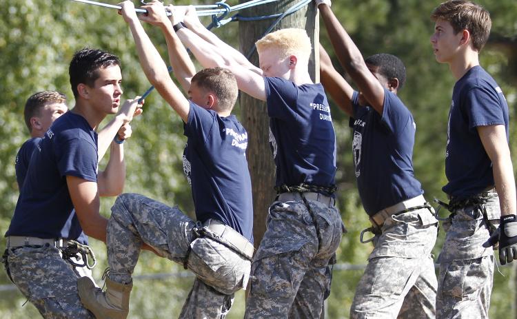 Elbert County JROTC Male Raiders team members (L-R) Logan Vickery, Briley Jenkins, Grady Thomas, Jordan Teasley, D.J. Veal and Nicholas Smith compete in the rope bridge event during a meet at Jackson County High School Sept. 21 in Jefferson. (Photo by Cary Best)