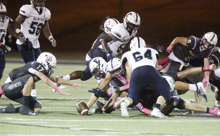 Blue Devils and Panthers fight for a loose ball in a Region 8-AA match-up which had three fumbles and three interceptions in Union County’s 35-14 win over Elbert County Friday night Oct. 4 in Blairsville.