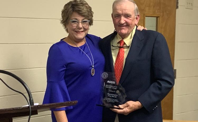 Representative Tom McCall received the 2019 Legislative Service Award from Debra Nesbit from the ACCG at the BOC meeting Oct. 16 (Photo by Scoggins).