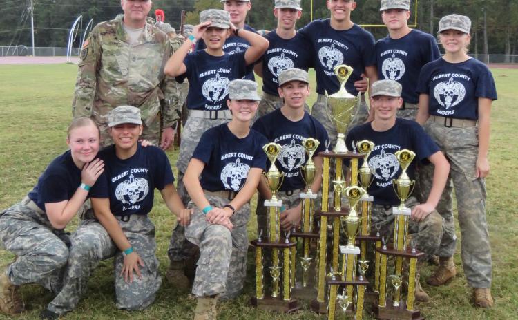 Elbert County Mixed JROTC team members (front, L-R) Haylee Marunich, Jamitel Bernier, Maelynn Ruff, Mathew Hernandez, Justin Bastyr; (back) Sgt.  Cadd, Marilynn Flores, Brandon Nestor, Gabriel Pless, Dean Blanchard, Thomas Vaughn and Makayla Ingle pose with the 2019 Mixed Team Raiders State Championship Oct 26 at Griffin High School. (Photo special to The Star)