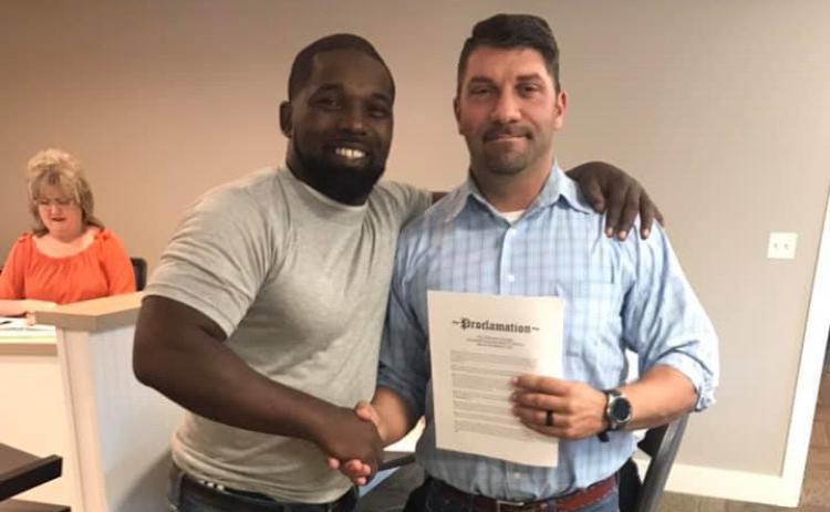 File photo of Pete Gibbons (right) with Mecole Hardman Sr.