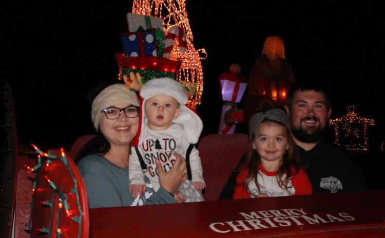 The Lunsfords – (L-R) Brittney, Charlie, Stella and Kyle – begin decorating two months ahead of Thanksgiving to open the family’s farm light display in Bowman. (Photos by Scoggins)