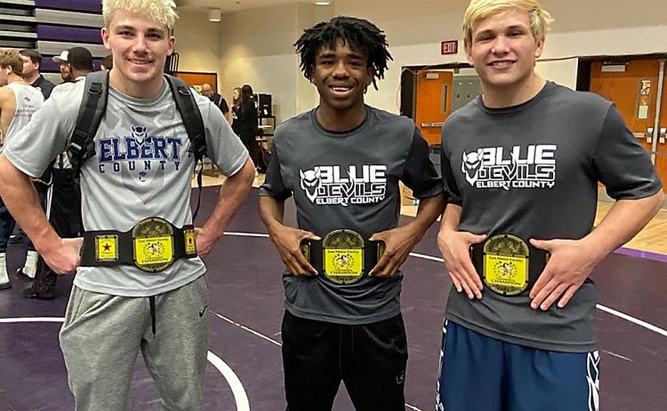 Mat Devils (L-R) Gavin Brady, Tyshawn Hughes and Brice Noggle each won their weight class during the East Metro Invitational Jan. 4 at Monroe Area High School. (Photo courtesy of Blue Devil Wrestling)