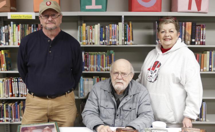 Roberta Rice (right) is pictured with council member Wade Bridges (left) and author Terry Kay at the Bowman Public Library's recent re-opening on Jan. 25.