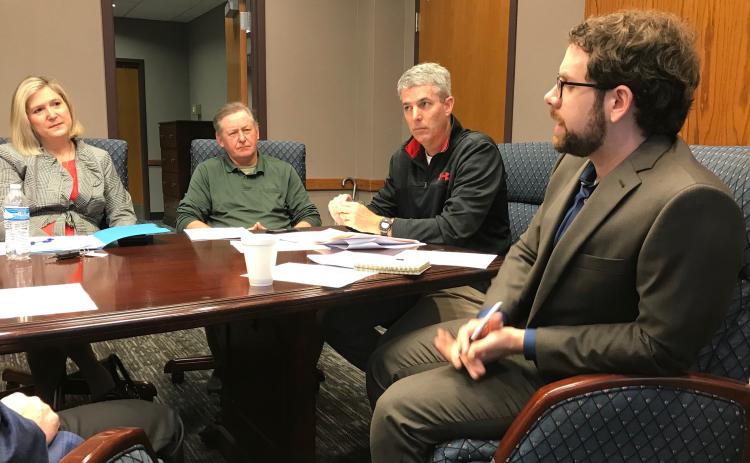 Daniel Dobbins (right), Economic Developer for the Development Authority of Elbert County, Elberton and Bowman, gave his first update to the authority at Athens Tech’s Elbert County campus Thursday morning. Shown at the meeting (L-R) are authority members Dr. Andrea Daniel, Randy Smith and Greg Gunter. (Photo by Jones)