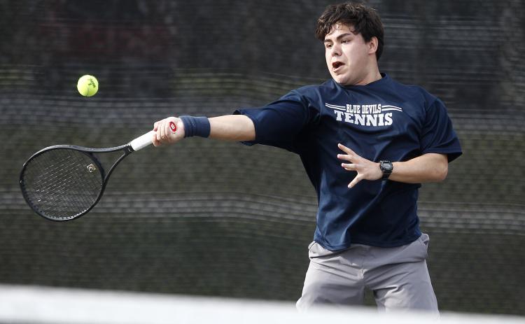 Blue Devil No. 1 singles player Kody Alcantar beat Purple Hurricane Conner Bradley 6-4, 6-1 during Elbert County’s region-opener win over Monticello at the B.F. Coggins Tennis Complex in McWilliams Park in Elberton. (Photo by Cary Best)