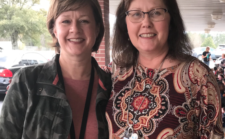 Daily traffic cops ... Elbert County Primary School Assistant Principal Laura Albertson and Principal Rosa Harris. (Photo by Jones)