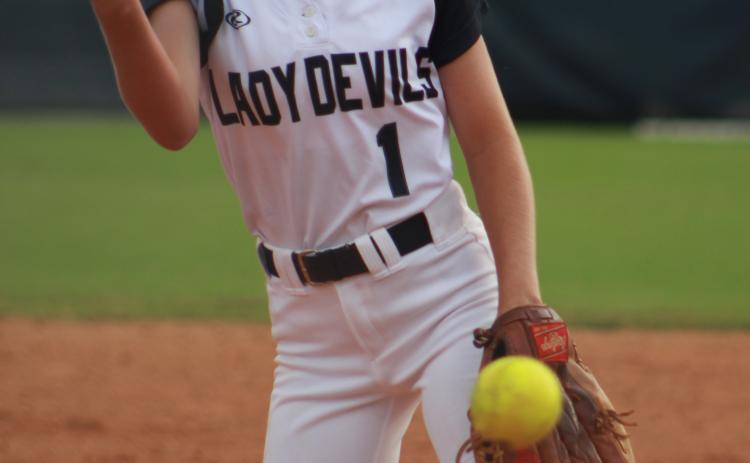 Sophomore Pitcher Jaynee Webb opened the Lady Devils softball game against Oconee Monday night at Wesley King Field. The team will travel to Prince Avenue Thursday for a 5 p.m. game. (Photo by Scoggins)