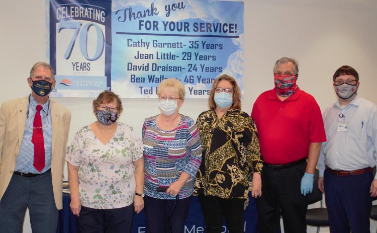 Five employees at Elbert Memorial Hospital are retiring with a combined 141 years of experience are (L-R) David Draisen, Bea Wallace, Jean Little, Cathy Garnett and Ted Dove. At the end of the line is EMH Chief Executive Officer Kerry Trapnell.