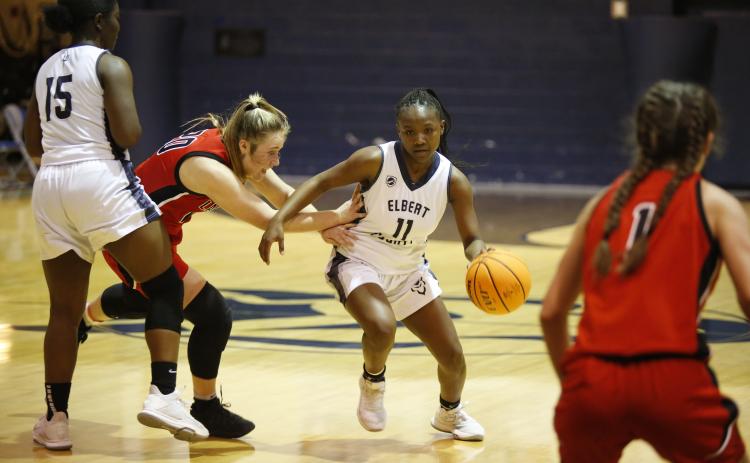 Sophomore Terrace Hester rushes down the court against a Rabun County Lady Cat in Friday’s competiton in the Inferno. (Photo by Scoggins)