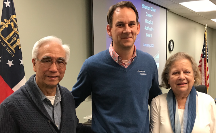 Dr. Glenn Poon (left) and Gail Lavender (right), who combined served 17 years on the Elbert Memorial Hospital Authority Board, were honored by Authority Chairman Daniel Graves at last week’s board meeting. Poon served 10 years on the authority board while Lavender served seven. (Photo by Jones)