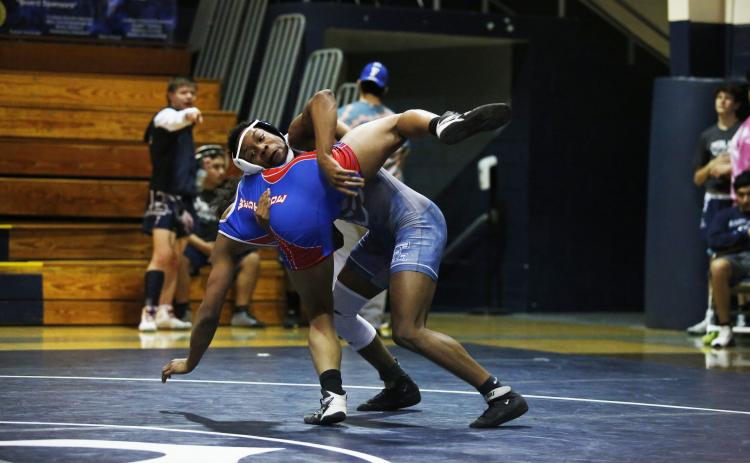 Junior Trez White finished in the semi-finals of the GHSA State Championships in Macon Feb. 10 to place fifth in the 170-pound division. (Photo by Scoggins)