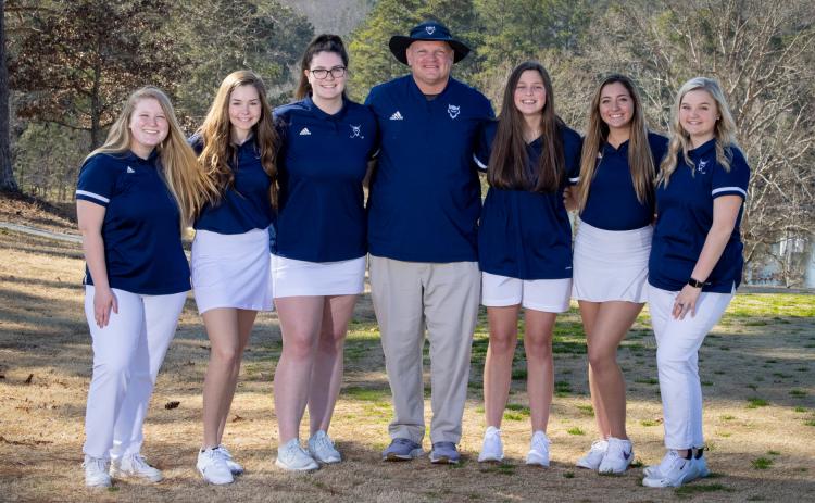 Lady Devil golfers include (L-R) Emma Grace Jarvis, Elizabeth Brady, Ava Dye, Coach Bruce Brown, Abby Bryant, Madison Webb and Emaleigh Oglesby.