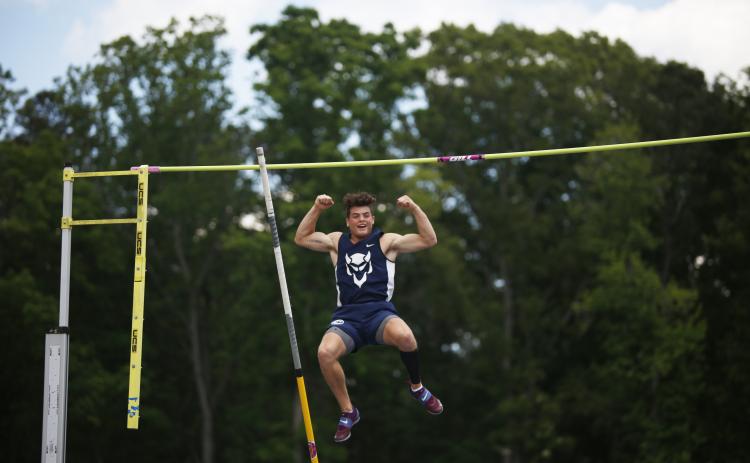 Senior Thomas Vaughn reacts to claiming the AA pole vault state championship Friday, May 14 at McEachern High School in Power Springs. Vaughn finished by clearing 14 feet and is the first state champion pole vaulter in Elbert County. (Photo by Scoggins)