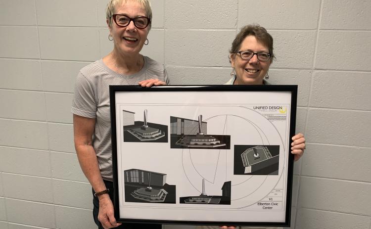 Gerry Besharat (left) and Pam Allgood display plans for the “Granite Feather,” which will displayed at the Elbert County Chamber of Commerce entrance. (Photo by Scoggins)