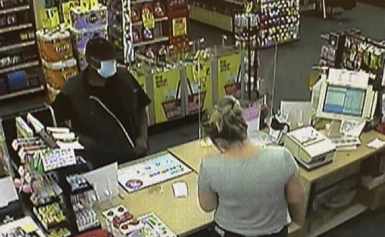 A man walked into this CVS on Elbert Street Saturday just before noon and slipped a clerk a note with a list of demands, according to an Elberton Police Department spokesman. The man left with an undetermined amount of money, said the spokesman. (Photo released by Elberton Police Department).