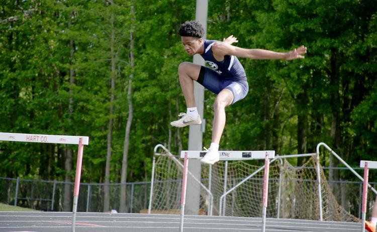 Track Devil Chastain Williams finished with a season best in the 300 meter hurdles during the Hart County meet Thursday. (Photo by Scoggins)