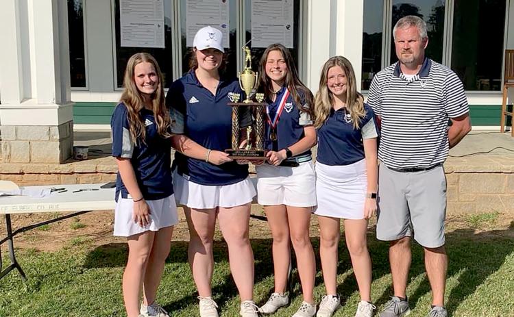 Elbert County’s Lady Devils took home the Area 4AA championship trophy Wednesday, April 27 at Arrowhead Pointe Golf Course after defeating defending state champion Lovett.