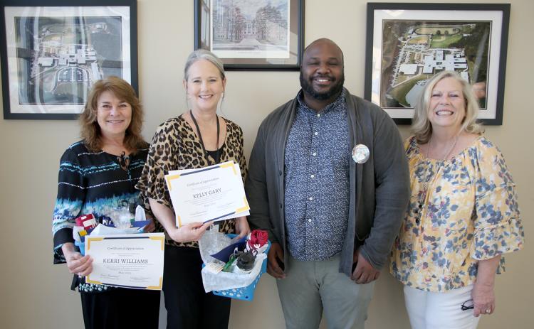 Pictured during a surprise presentation honoring them as the Emmanuel College Cooperating Teachers of the Month for May were (L-R) teachers Kerri Wiliams, Kelly Gary, nominating student teacher Isaiah Garnett and Director of Field Experience at Emmanuel Debbie Maxwell. (Photo by Scoggins)
