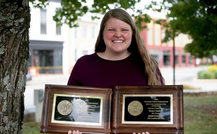 Editor Rose Scoggins took home first place out of all the weekly newspapers in the state for photo portfolio and first place in the The Star’s Division E for sports photo. (Photo by Evans)