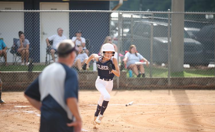 Peyton Jenkins makes her way to first base during the Lady Rams’ exhibition game against Washington-Wilkes Saturday, July 30.
