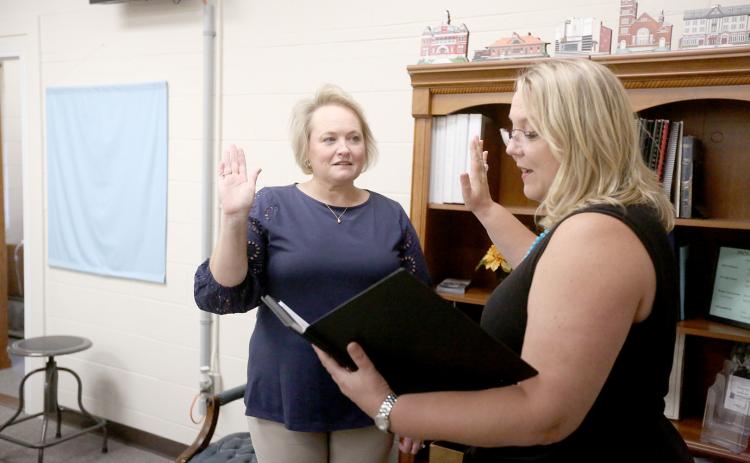 Heather Nestor (left), the newest District 3 representative on the Elbert County Board of Education, was sworn in by Probate Judge Stephanie Hewell  (right) Friday, Aug. 5. (Photo by Scoggins)