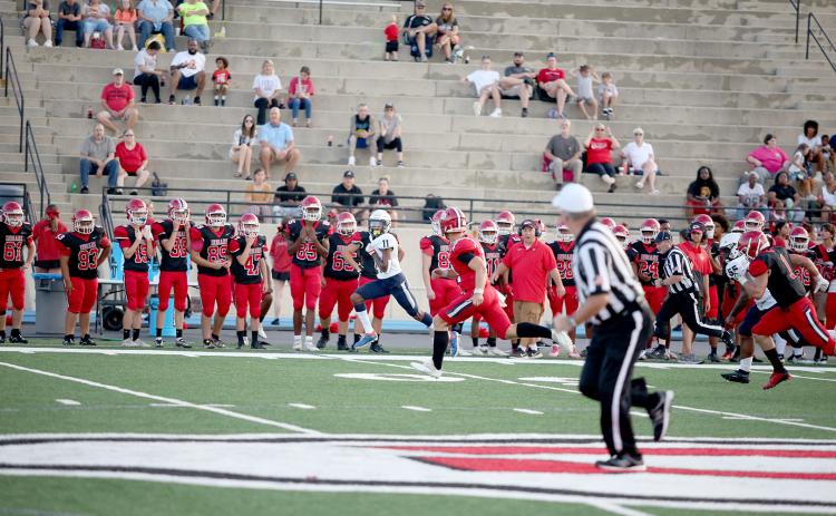 Devil Christian Harris intercepted a Stephens County pass for a 69-yard touchdown during the first half of Friday’s scrimmage. (Photos by Scoggins)