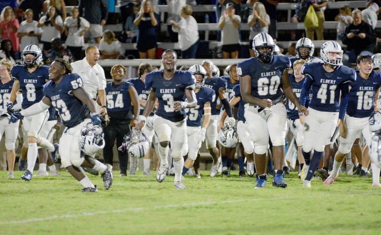 The Blue Devils celebrate their 31-28 win over Hart County after the game Friday, Aug. 19. (Photo by Drew Dotson, The Hartwell Sun)
