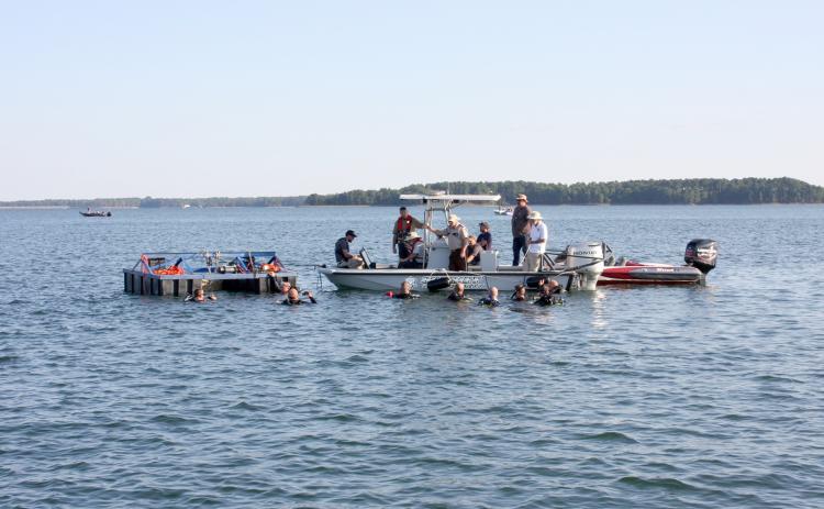 Members of the Elbert County Water Response and Rescue Team helped recover the body of a pilot of a double-engine plane that crashed in Lake Hartwell Sept. 10. The pilot was identified as Todd Jeffrey Carrell, 55, of North Port Florida. (Photo courtesy of Elbert County Emergency Services)