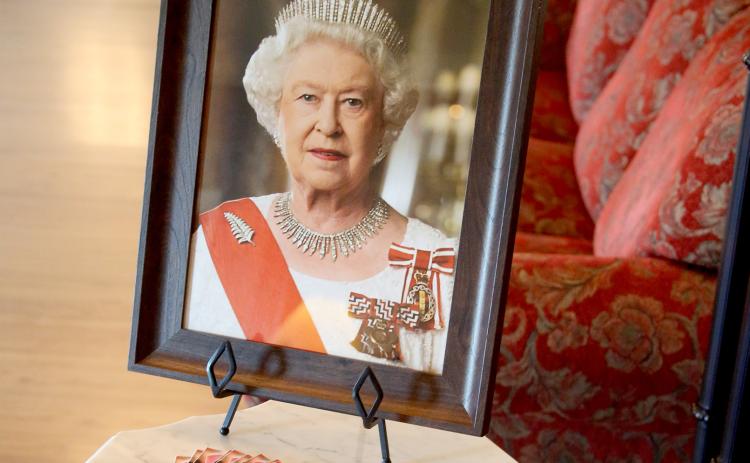 Berry Funeral Home has set up a guest book, along with a place to leave sympathy cards and mementos to send to the United Kingdom archives. (Photo by Scoggins)