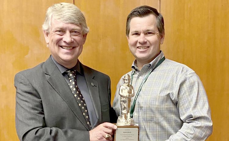Elbert County’s Mark Wiles (left) received a Silver Smokey Award, the top honor for those working in wildfire prevention, in September.
