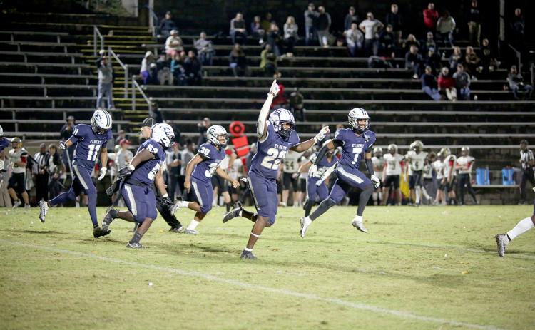 The Elbert County Blue Devils are headed to the second round of the GHSA state playoffs after a 31-7 win over Pepperell High School in the first round Friday, Nov. 11. (L-R) Christian Harris (No 11.), D.J. Raiford (No. 53), Miguel Rodriguez (No. 30), Malik Hill (No. 22) and L.J. Clark (No. 7) react to a play during the Devils’ win over the Dragons. (Photo by Scoggins)