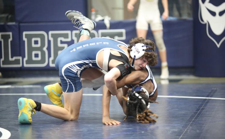 Elbert County Middle School Mat Ram wrestled with the junior varsity Mat Devils during the JV Inferno Invitational Tuesday, Nov. 22. Fleming finished third in the 106-pound weight class for the day. (Photo by Wells)