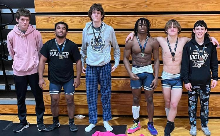 The Mat Devils had eight wrestlers to finish in the Top 6 during the East Hall Christmas Clash Dec. 22.