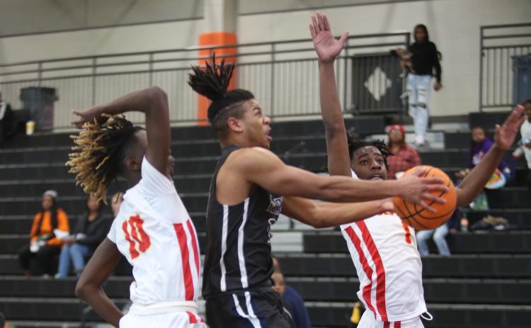 Senior Trustin Allen was the leading scorer for the Devils during the McDonalds Shootout in Hartwell Dec. 27 through Dec. 29. (Photo by Scoggins)