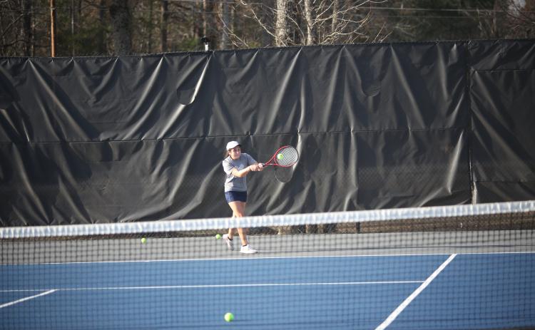Devils and Lady Devils Emily Poon, Justin Brown, Broughton Smith and Katie Nguyen kicked off the 2023 tennis season Feb. 7 against Tallulah Falls at McWilliams Park. (Photos by Wells)
