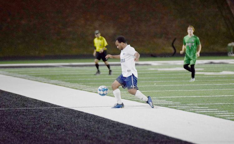 Blue Devil Jamaze Hall works the ball around a Franklin County defender in Carnesville Feb. 21. (Photo by Shane Scoggins, Franklin County Citizen Leader)