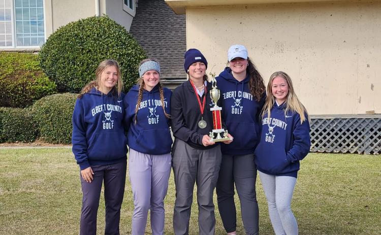The Lady Devils golf team finished in first place in the Cougar Invitational at Mirror Lake in Villa Rica March 18. Pictured with the first place trophy are (L-R) Ellie Wheeler, Emalise Andrews, Abby Bryant, Ava Dye and Addy Evans.