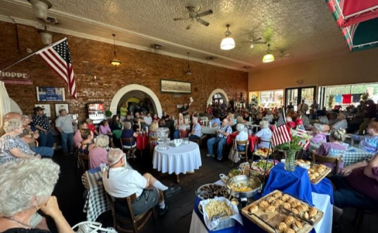 A large crowd gathered at the Elbert County Republican Party meeting June 8 at McIntosh Coffee Shoppe to listen to Elbert County Chief Appraiser Doug Kirkpatrick explain the property revaluation process. The Republican Party will host another meeting Thursday, June 15 at 6:30 p.m. in the Elbert County Government Complex cafeteria. (Photo by Scoggins)