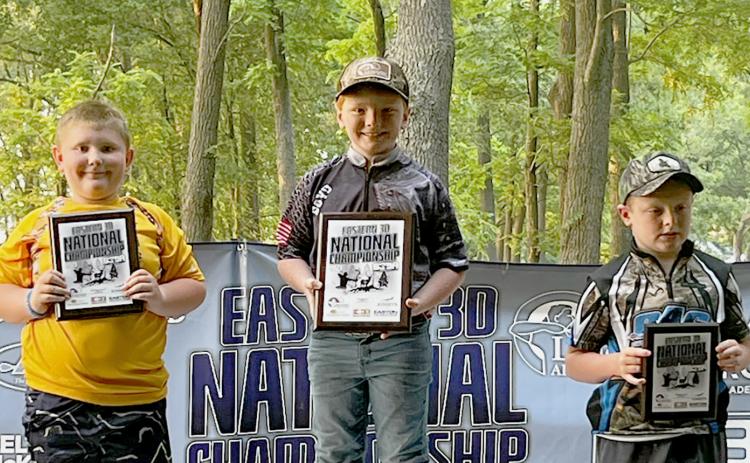 Elbert County’s Boyd Carrington (middle) was crowned the 2023 S3DA male Junior Eagle pins National Champion during the 2023 Eastern S3DA 3D National Championship in Rend Lake, Illinois June 15 through June 18. Carrington, who participates in Disciple Archery through Dewy Rose Baptist Church, was crowned the national champion following a state champion award and 2023 shooter of the year award during the Georgia S3DA 3D State Championship event in Maysville June 10.