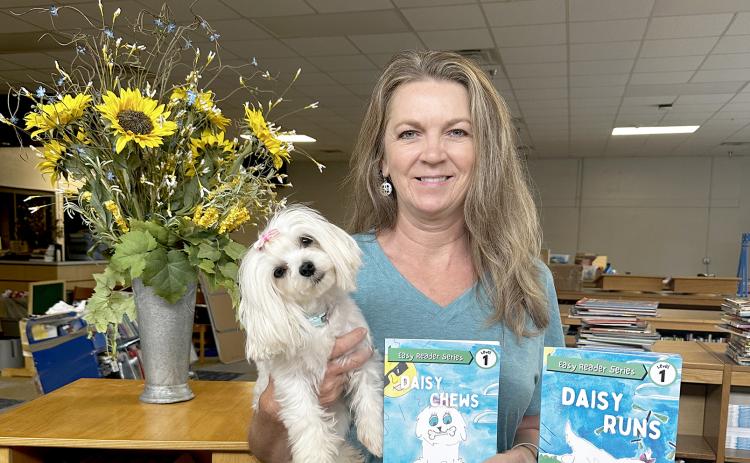 Elbert County Primary School media specialist and local author Michelle Scarborough has published her third book in her “Crazy Daisy” series inspired by her pet Maltese, Daisy. (Photo by Hall)